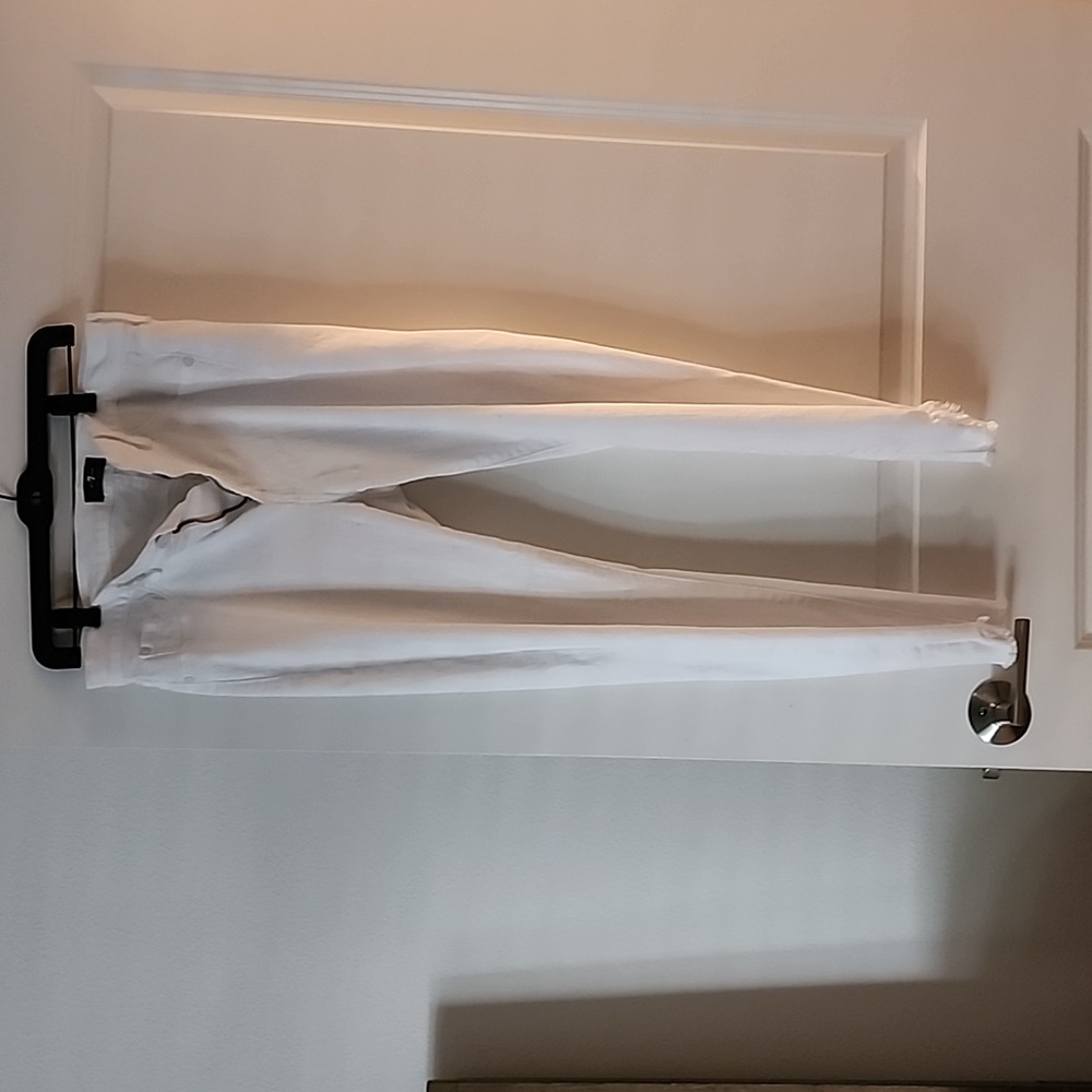 White jeans with frayed hem